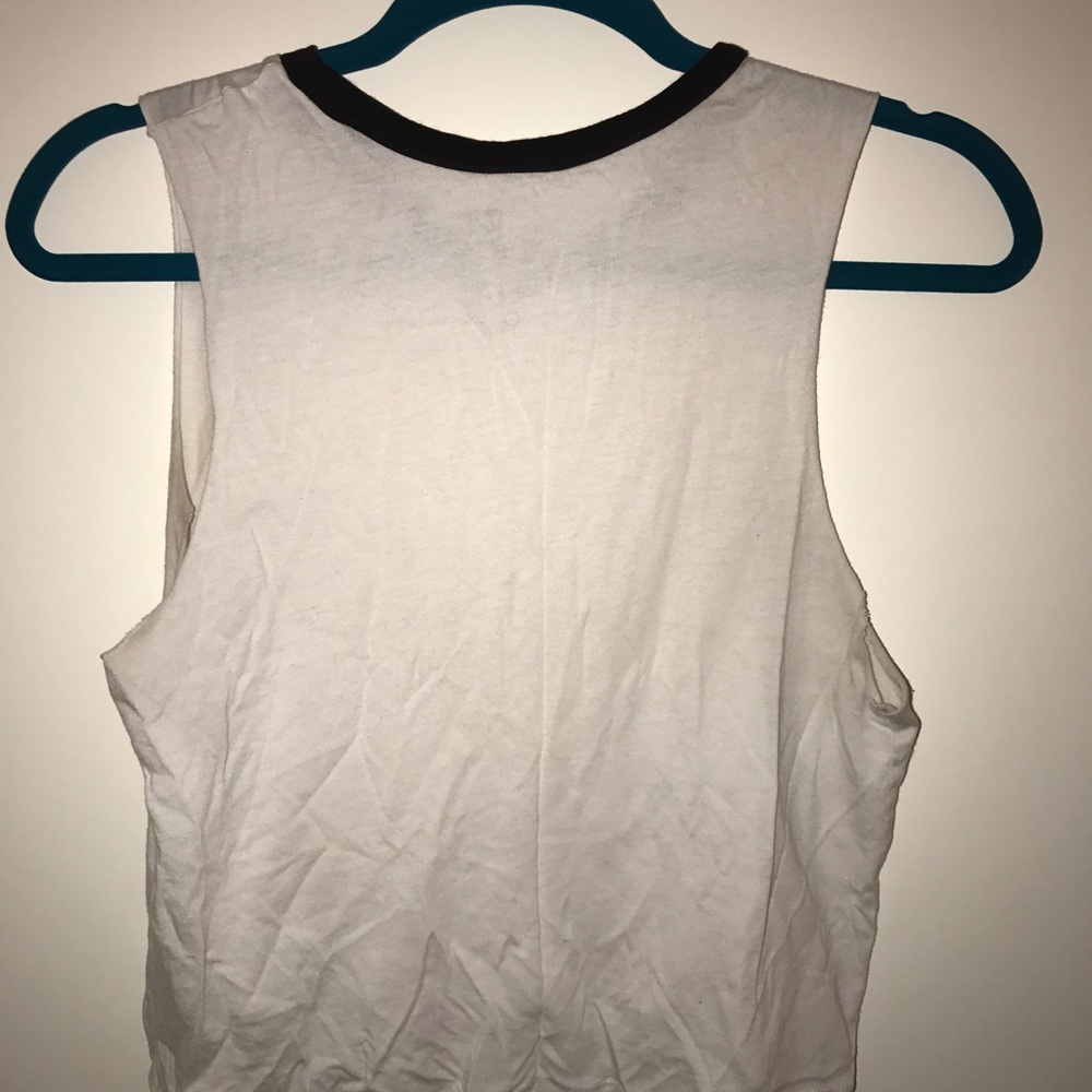 Slightly cropped muscle T